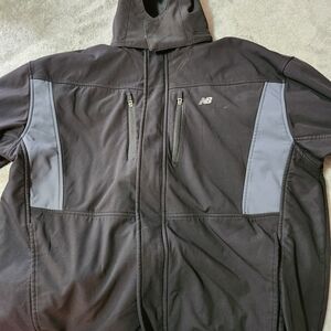 New Balance Men's Black and Gray Jacket with removable liner and hood.